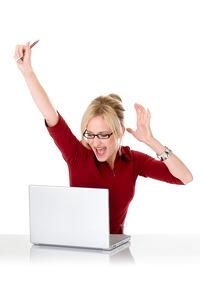 excited girl at computer